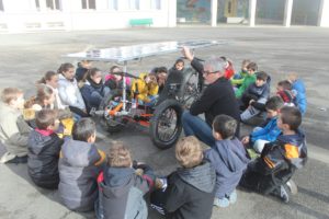 Bermard teaching kids the solar technology in France