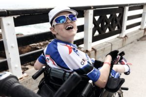 Hase Pino Riding Ironman With Disabled Son 02