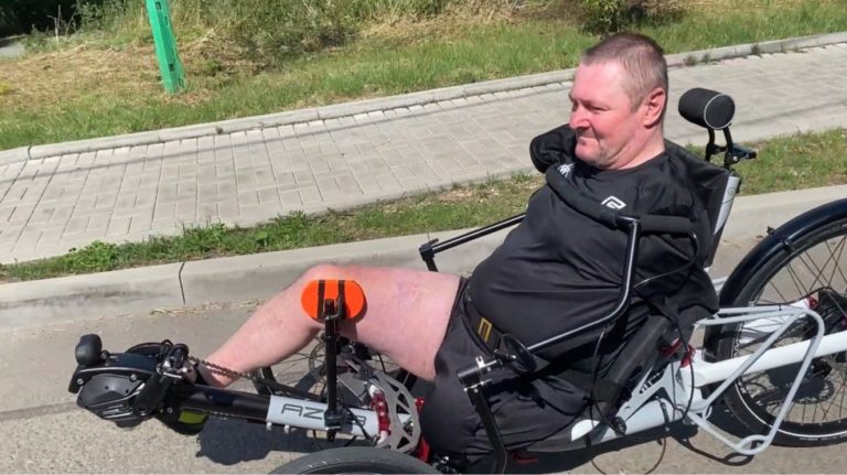 recumbent trike built for handicapped rider with no hands