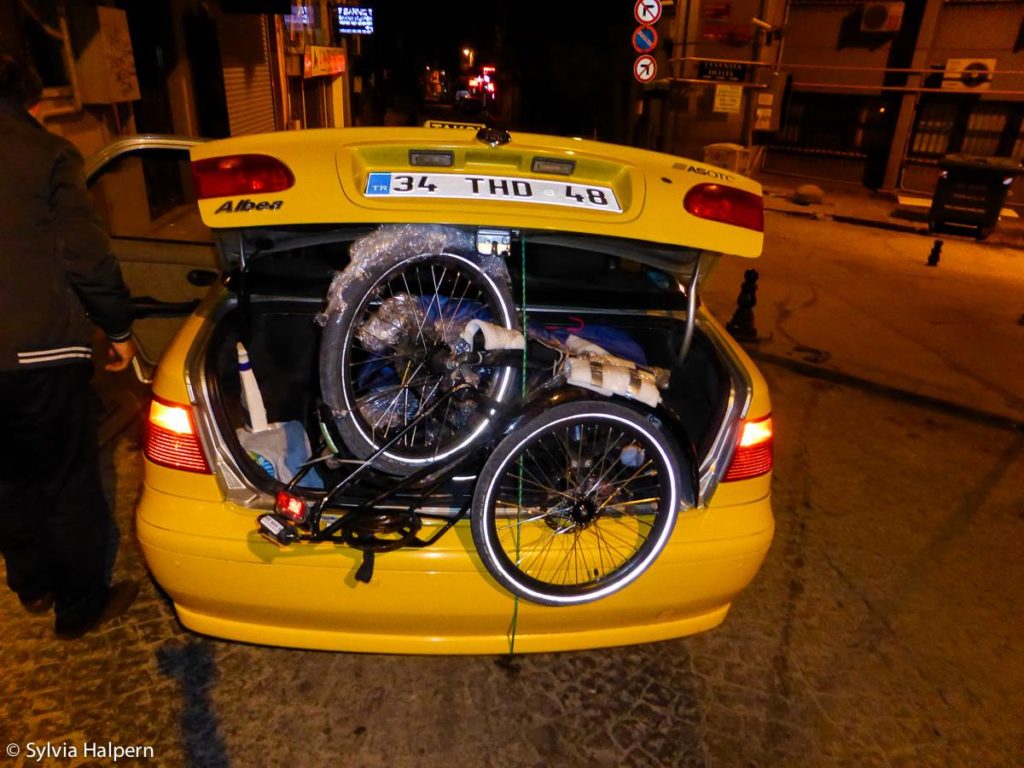 Packed in the taxi while touring Turkey by bike