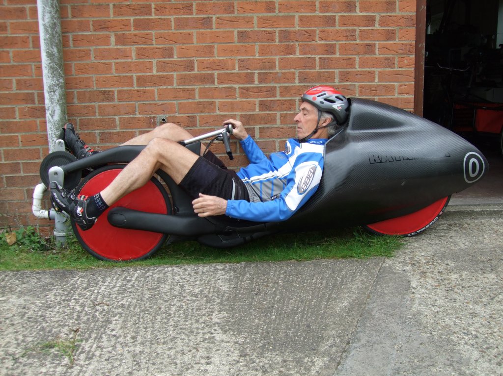 Mike Burrows sitting-in his Ratracer with hub center steering