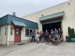 Current team of the Terra Cycle in front of the new shop