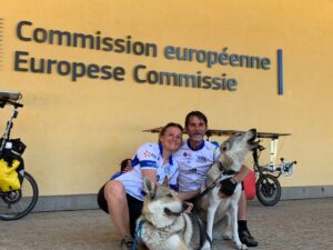 solar-powered recumbent four-wheel bicycle on tour - European Comittee