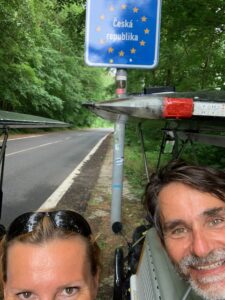 solar-powered recumbent four-wheel bicycle on tour - crossing the borders of Czechia