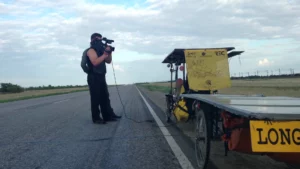 How many legs and arms does the camera guy have? :-)