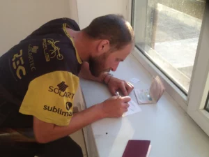 Filling the necessary paperwork at the Kazakh border