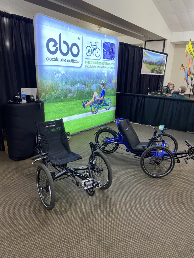 Denevres, Colorado engine manufacturer EBO was displaying their mid and hub motors and also talked about an idler with an integrated PAS sensor that senses pedaling cadence. Very unique new recumbent technology. 