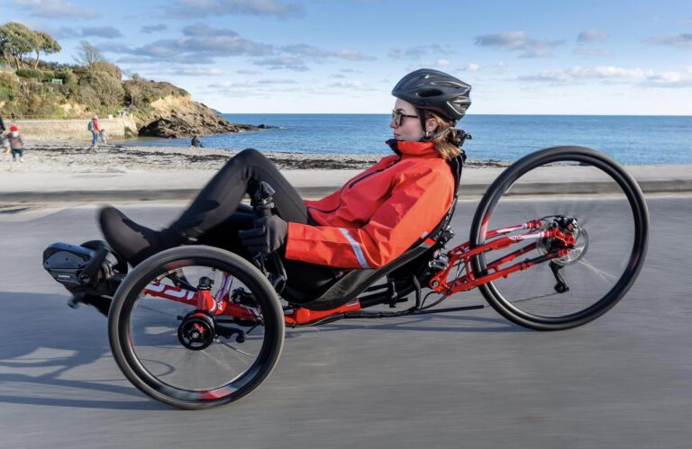 Lady riding on an ICE Sprint X in red color