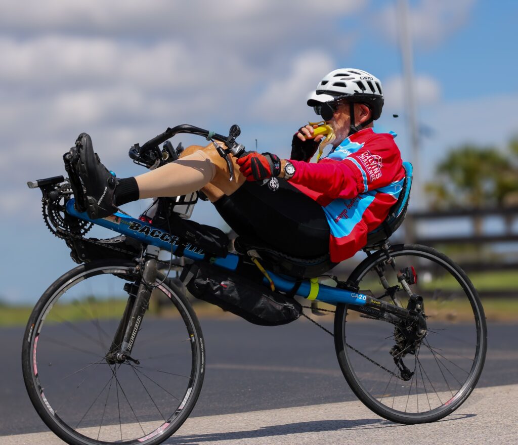 Recumbent rider racing his Bacchetta CA 2.0